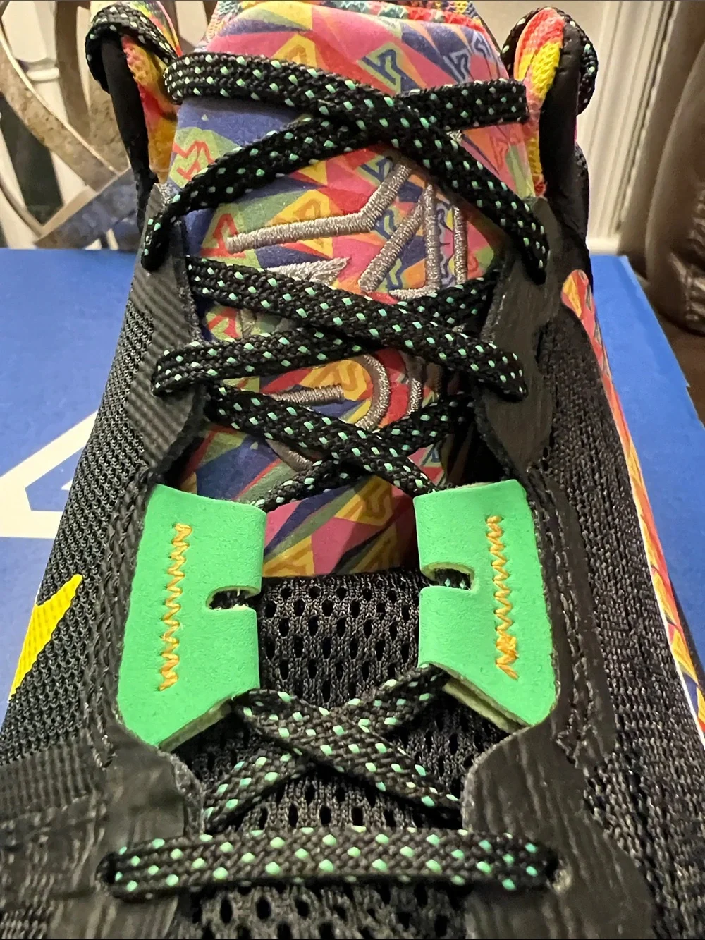 Nike Kids Black Sneakers with Yellow Accents and Multicolor Swoosh